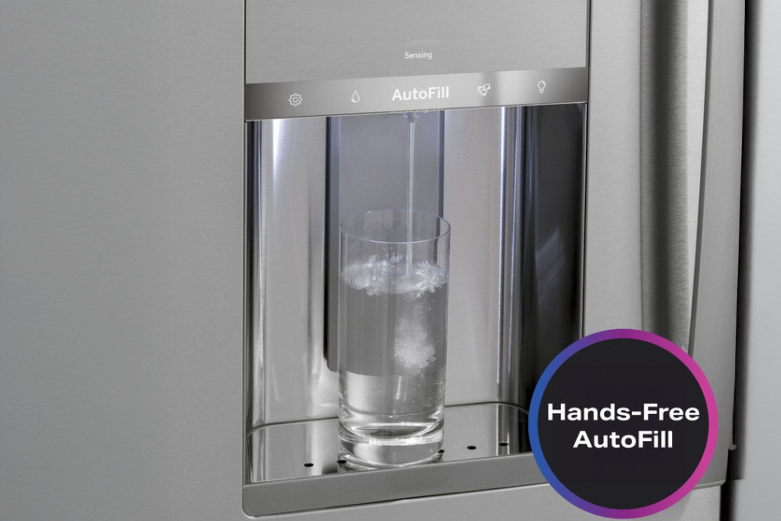 GE Profile refrigerator dispenser using hands-free autofill.