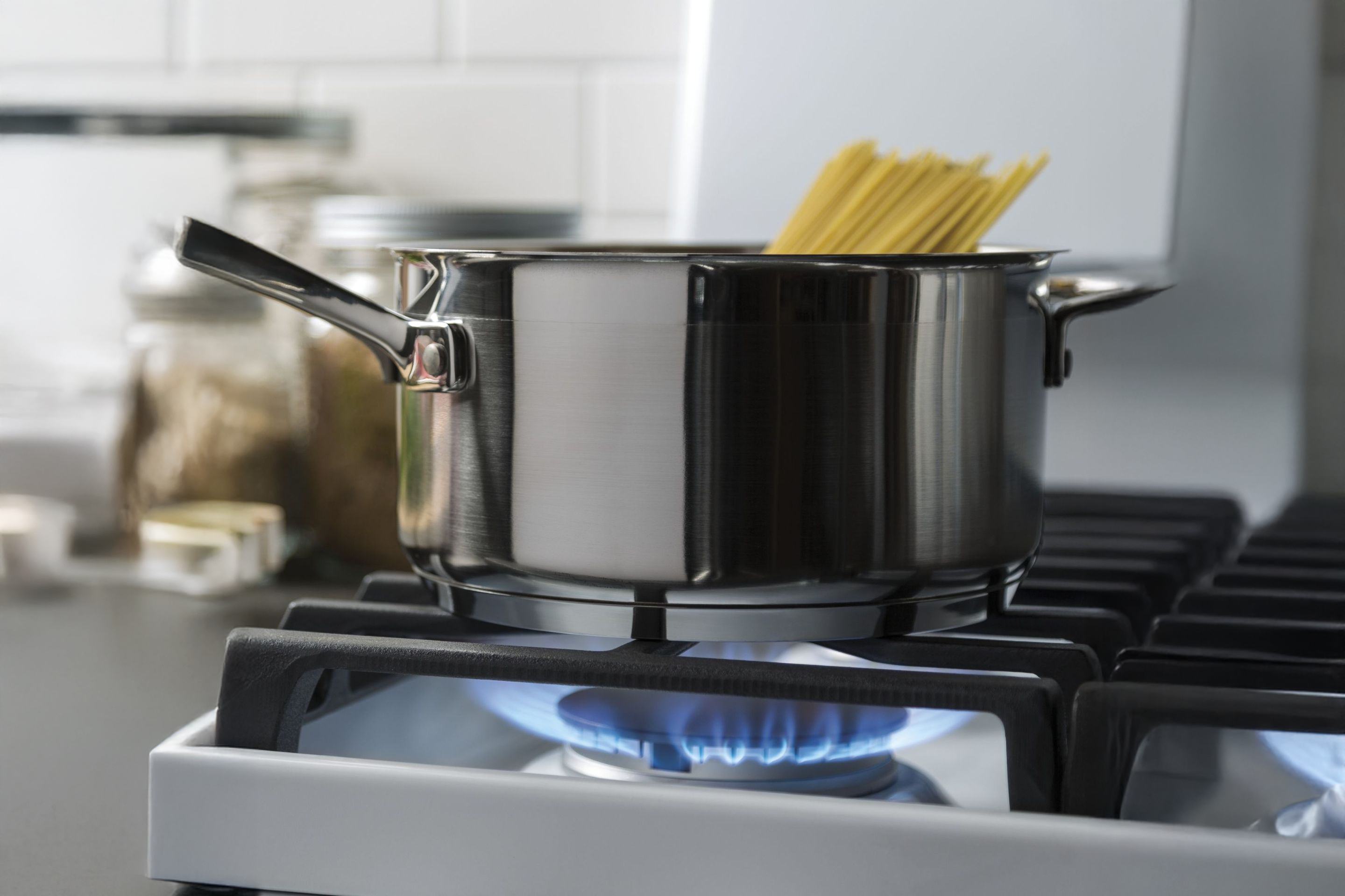 GE Profile range burners with power boil capability.